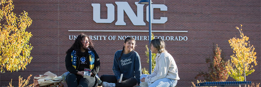 UNC students on campus smiling